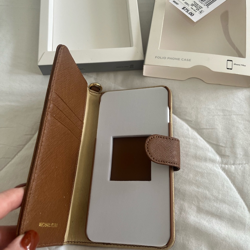 Michael Kors phone wallet.